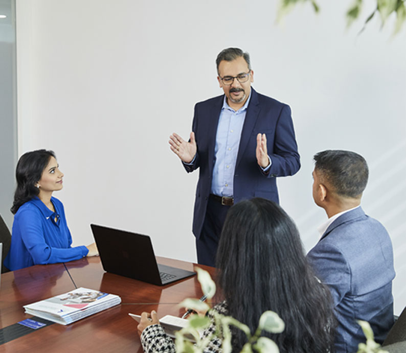 affility-business-strategy Business team discussing strategy plans.